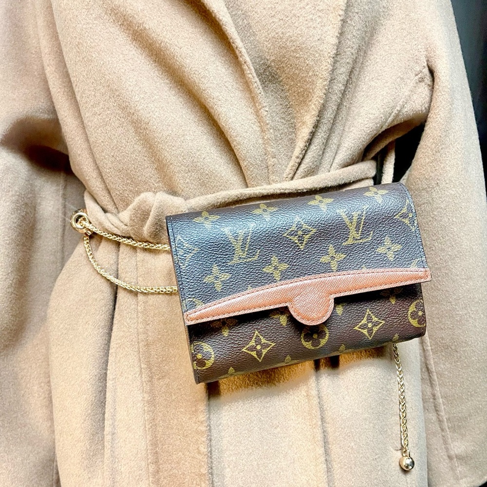 Authentic Louis Vuitton monogram vintagee Arche belt bag MI1906 (D5020)